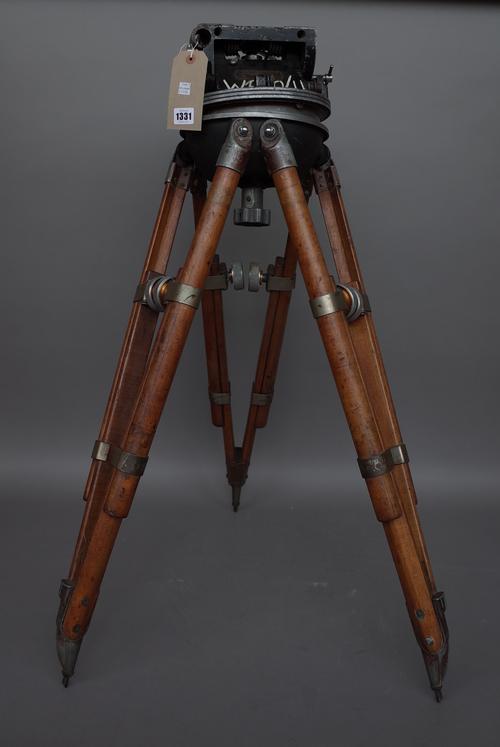 An Akeley Gyro tripod for an early 20th century 35mm movie camera.