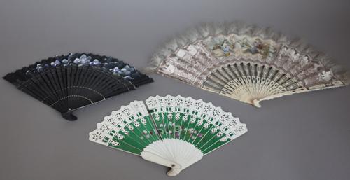 A Chinese export gilt lacquered fan, 25.5cm, a late 18th century ivory fan painted with Oriental figures, 26cm, an early 19th century pierced bone fan