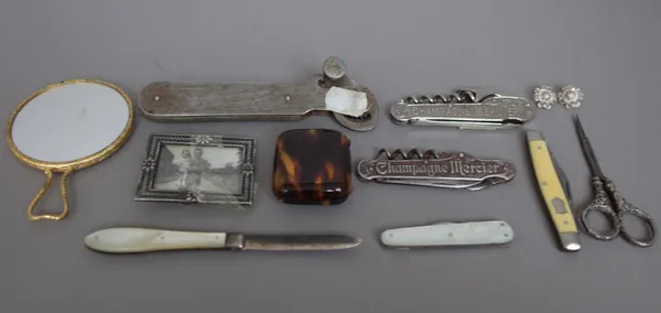 A quantity of small collectables including; two Mercier champagne bottle openers, a metal can opener, mother-of-pearl fruit knives and sundry, (qty.).