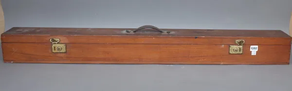 An early 20th century drop down projector screen housed in a wooden carry case, 117cm wide.