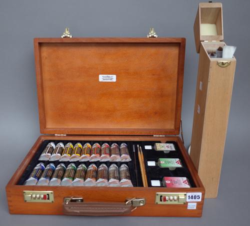 A 'Rembrandt' oil painting set in a mahogany briefcase, 42cm wide, a 'LeFranc & Bourgeois' mahogany artist's easel, 152cm high, and a box containing p