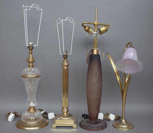 A modern coloured glass table lamp of twisted ovoid form, 60cm high, a gilt metal corinthium column table lamp, a gilt metal and glass mounted table l