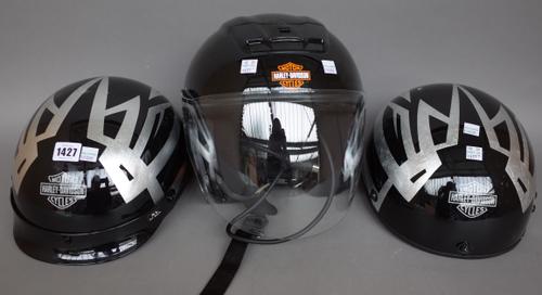 Three vintage Harley Davidson motorcycle helmets and two other helmets, (5).