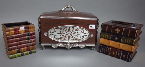 A Maitland Smith mahogany and white metal mounted casket and cover of canted rectangular form with oval mirrored decoration, 36cm wide, a novelty tiss