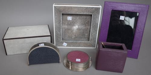 A Dunhill style shagreen covered cigarette box, a similar shagreen covered dish of square form (21cm wide), a photograph frame, letter holder and sund