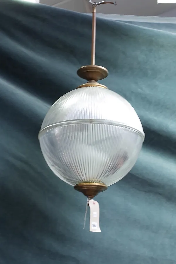 An Art Deco style cellophane glass chandelier of moulded circular form with brass embellishments and an internal light fitment, 80cm high.