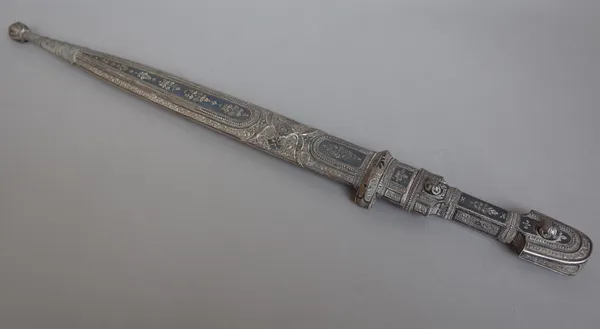 A Caucasian nelio silver kindjal, late 19th century, with double edged engraved steel blade, 33.5cm and silver overlay.