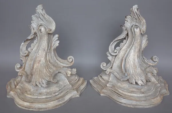 A pair of modern Italian carved wooden wall brackets, each distressed grey Florentine style, 31.5cm high, a giltwood carved strutback table mirror, 54