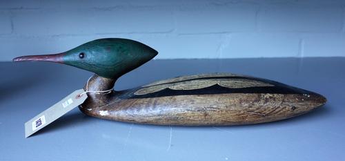 Guy Taplin (British Born 1939) Merganser, polychrome carved wood and gesso duck, signed to the base, (a.f.) 51cm wide.  DDS