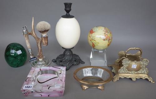 A 19th century style metal candlestick with 'Ostrich egg' mount, 30cm high, eight gilt engraved coloured glass eggs on gilt metal stands, eight glass