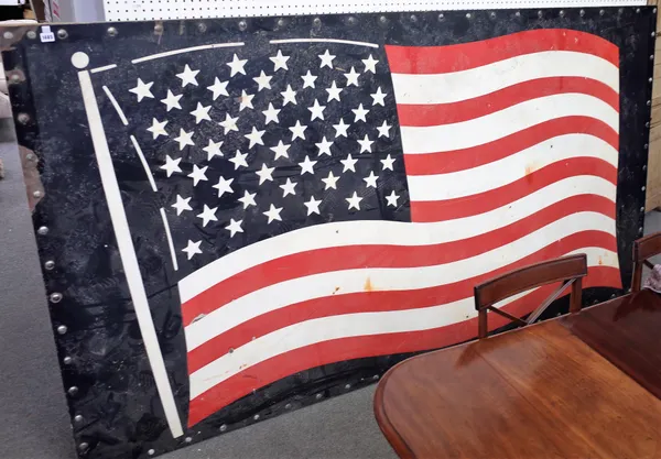 An enamelled sheet steel panel depicting the American flag, mid-20th century, possibly part of a ship, with a riveted border and oak frame to rear, 27