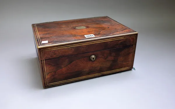 Edwards Manufacturer to His Majesty, 21 King St, Bloomsbury, London; an early 19th century brass bound rosewood travelling writing /toilet box with fi