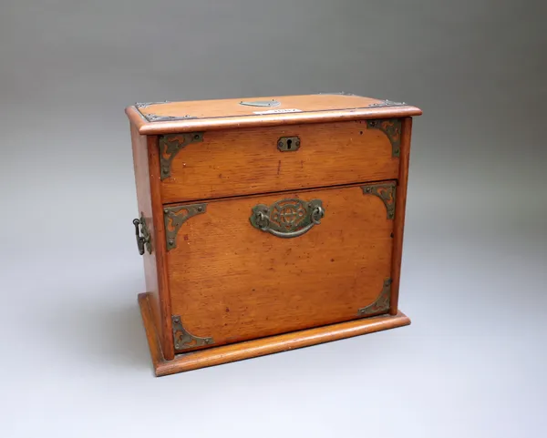 A Victorian metal mounted oak stationery box, with lift and fall front, 31cm wide x 71cm high.