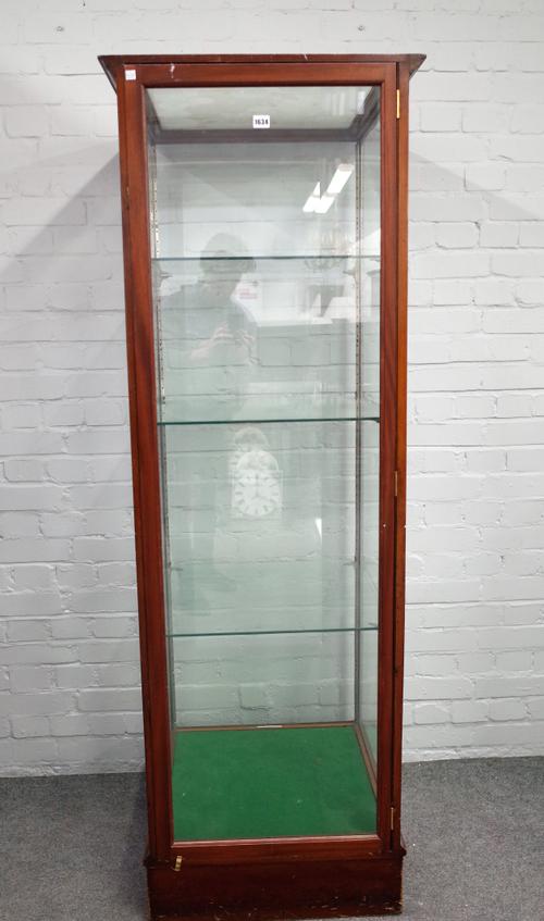 Philip Joseph & Son, London; a mahogany framed glazed floor standing display cabinet, on plinth base, 63cm wide x 184cm high.