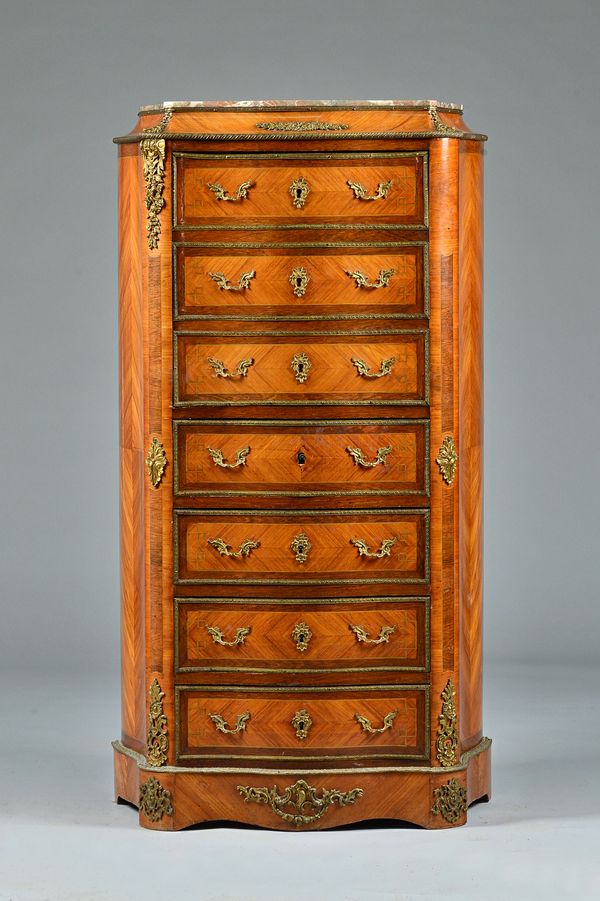 A late 19th century French marble top gilt metal mounted kingwood serpentine semainier, in the manner of Meubles de Paris, 66cm wide x 125cm high. Ill