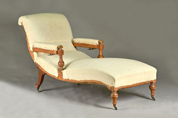 A 19th century French walnut framed open arm reclining chaise longue, on turned supports, 72cm wide x 165cm long.