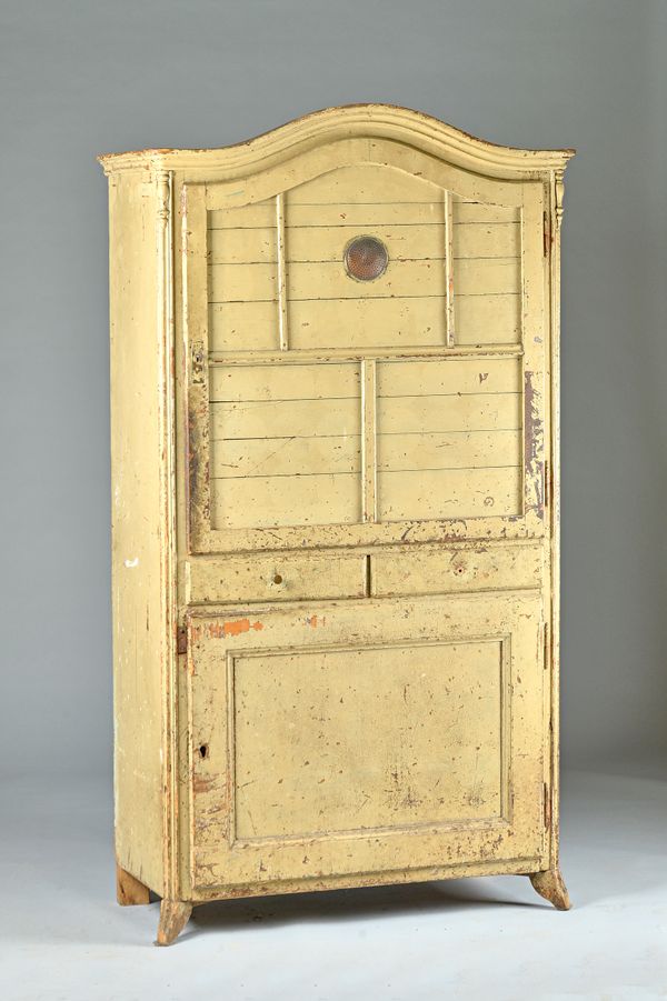 An early 19th century Continental painted pine arch top cupboard, with a pair of doors, divided by pair of drawers, 99cm wide x 181cm high. Illustrate