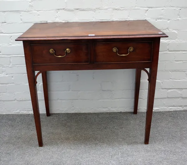 An early 19th century mahogany two drawer side table on tapering square supports, 80cm wide x 74cm high.