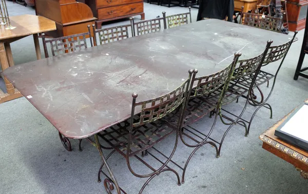 A 20th century sheet metal rectangular garden table on scroll supports, 111cm wide x 248cm long.