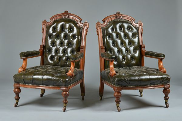 A pair of Victorian walnut framed leather upholstered open armchairs, with bow seat on turned supports, 70cm wide x 106cm high, (2). Illustrated