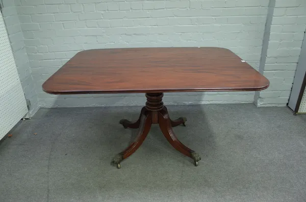 A George III mahogany rectangular snap top breakfast table on four downswept supports, 106cm wide x 138cm high.
