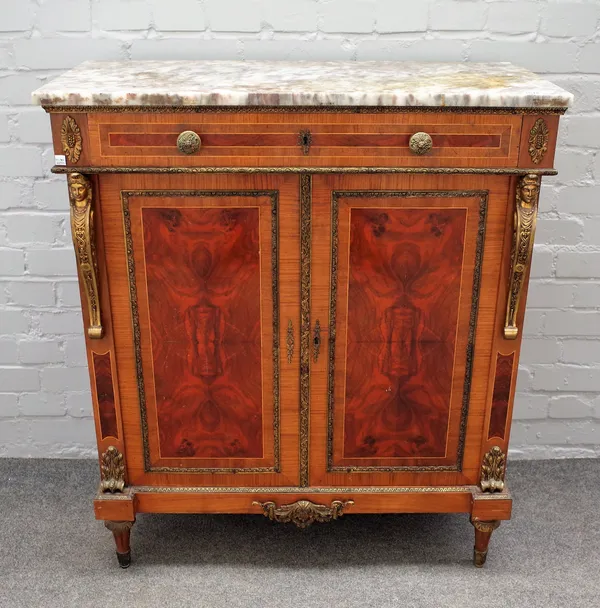 A late 19th century French marble top side cabinet, the gilt metal mounted walnut and kingwood base with single drawer over cupboards flanked by carya