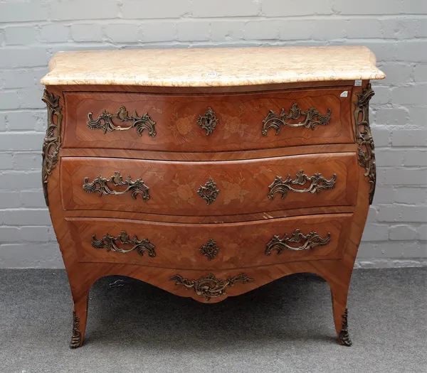 A Louis XV style commode, the serpentine marble top over a gilt metal mounted marquetry inlaid bombe three drawer base, 106cm wide x 89cm high.