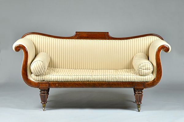 A William IV rosewood framed sofa with tablet crest rail and outswept arms on tapering reeded supports, 197cm wide x 92cm high. Illustrated