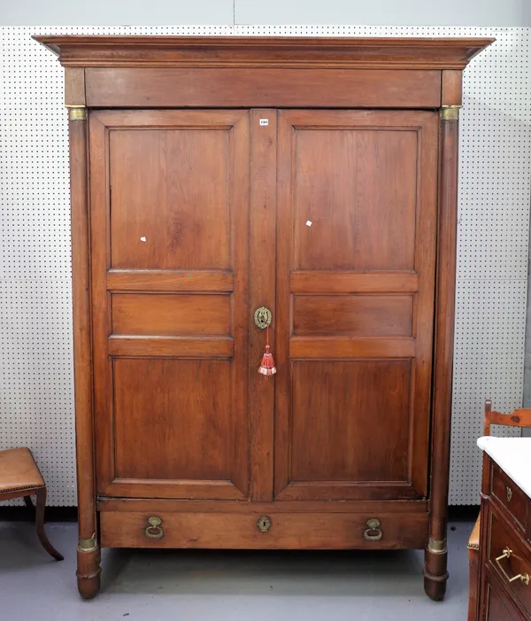A 19th century French chestnut armoire with pair of double panel doors over single drawer, 169cm wide x 220cm high.
