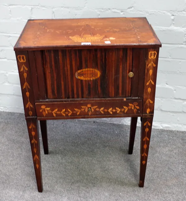 A late 18th century Dutch floral marquetry inlaid tambour front bedside table on tapering square supports, 50cm wide x 70cm high.