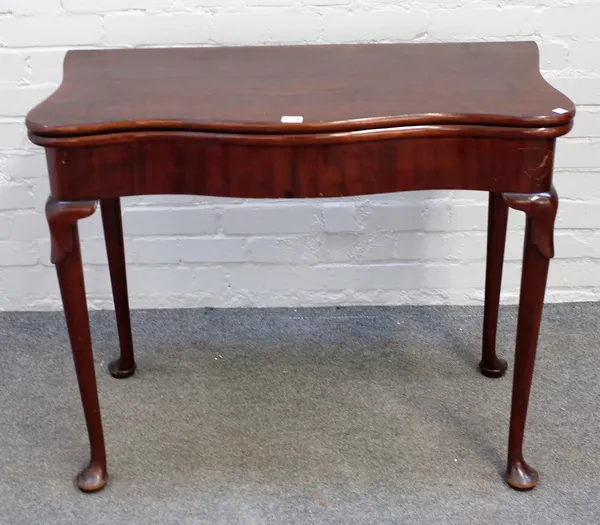Edwards & Roberts, a mid-18th century style mahogany concertina action card table on club supports, 89cm wide x 74cm high.