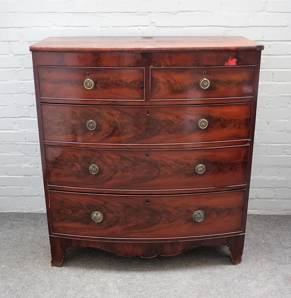 A Regency mahogany bowfront chest of two short and three long graduated drawers on bracket feet, 107cm wide x 117cm high.