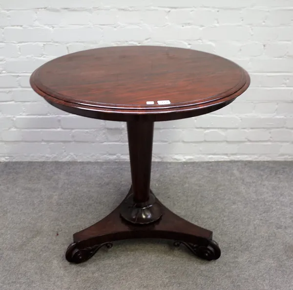 A William IV rosewood circular centre table on tapering turned column and three scroll feet, 74cm diameter x 71cm high.