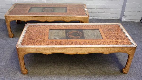 A pair of cream lacquered chinoiserie decorated rectangular coffee tables inset with marquetry inlaid shagreen panels, 51cm wide x 117cm long.