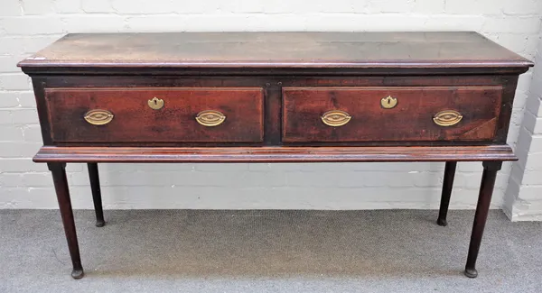 A George III oak dresser base with pair of frieze drawers on turned supports and pad feet, 163cm wide x 86cm high.