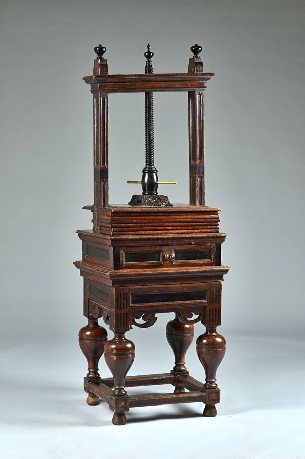 An 18th century oak book press with single frieze drawer on four bulbous supports, united by perimeter stretcher, 61cm wide x 167cm high. Illustrated