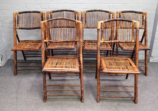 A set of six early 20th century folding bamboo chairs, 48cm wide x 90cm high.