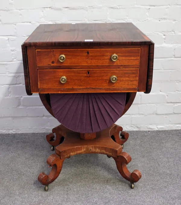 A Regency rosewood drop flap work table with a pair of drawers over wool box, on four scroll supports, 53cm wide x 75cm high.