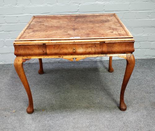 A George III style mahogany silver table, the galleried top with single drawer cushion frieze, on cabriole supports, 73cm wide x 56cm high.