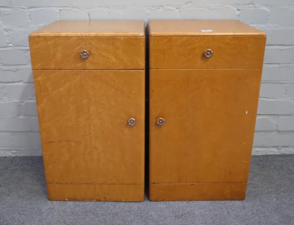 A pair of mid-20th century birdseye maple bedside tables, each with single drawer over cupboard, 36cm wide x 62cm high.