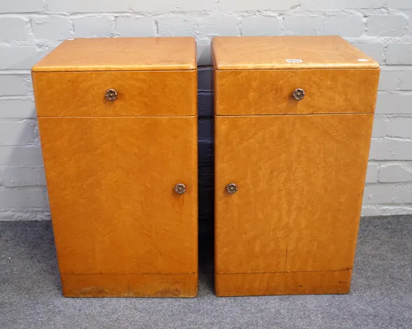 A pair of mid-20th century birdseye maple bedside tables, each with single drawer over cupboard, 36cm wide x 62cm high.
