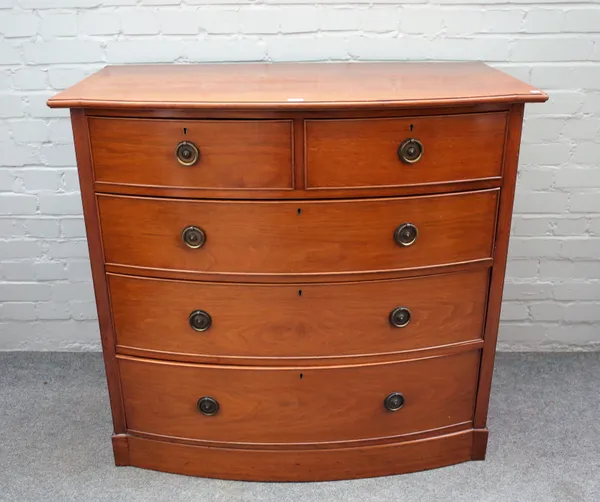 A late 19th century walnut bowfront chest with two short and three long graduated drawers on a plinth base, 107cm wide x 99cm high.