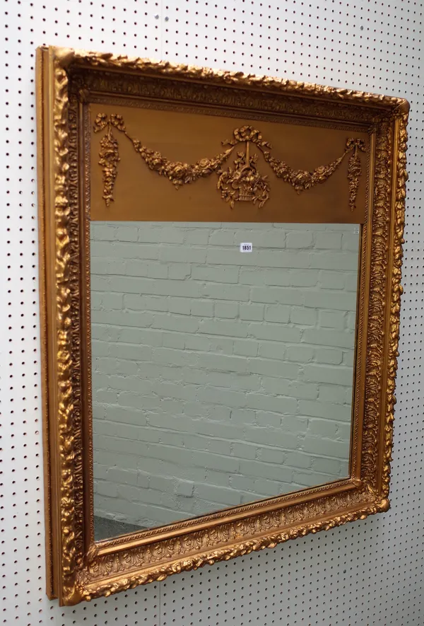 A 19th century gilt framed trumeau mirror with floral swag frieze and moulded frame, 98cm wide x 118cm high.