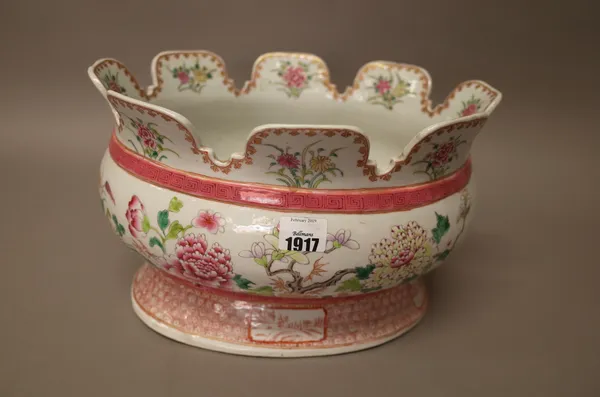A French `famille-rose porcelain monteith, probably Samson, late 19th century, of oval form, painted in Chinese export style with flowering shrubs, th