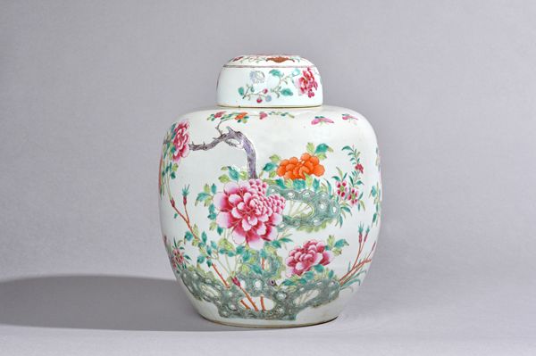 A large Chinese famille-rose oviform jar and cover, 19th century, enamelled with tree peony growing amidst rockwork  beneath insects, the cover painte