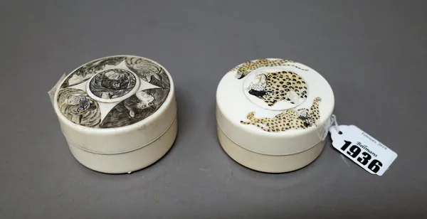 A Japanese ivory circular box and cover, Meiji period, the cover carved in low relief with a leopard's head surrounded by two prowling leopards, 6.5cm