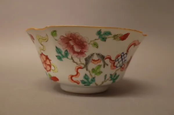 A Chinese famille-rose bowl, late 19th/20th century, painted in the interior with a pomegranate and peony ,the exterior painted with flowers and Buddh
