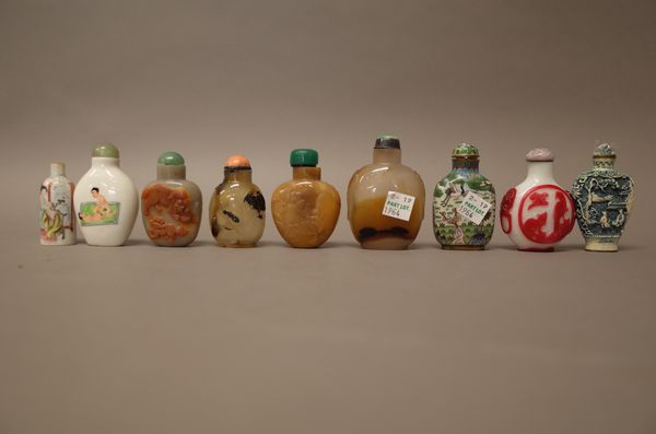 A group of seventeen Chinese snuff bottles, 20th century, including; three overlay glass bottles; two celadon jade and russet examples; three porcelai