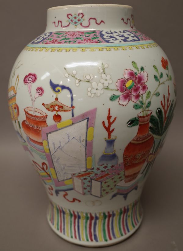 A Chinese famille-rose `Hundred Antiques' baluster vase 19th century, 37cm. high.