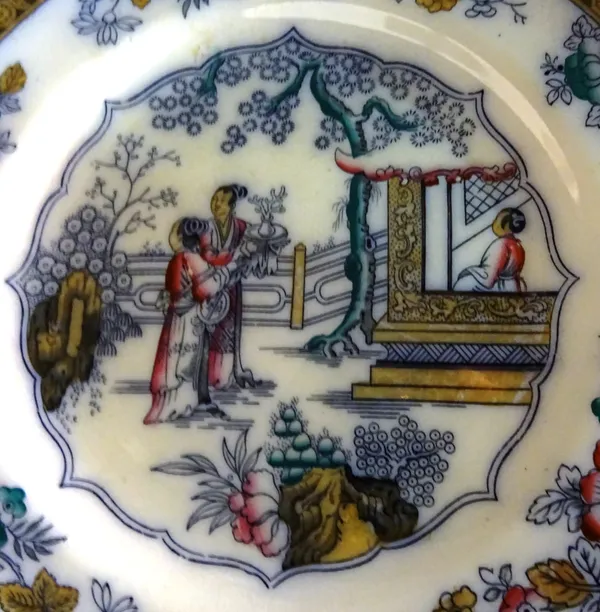 A part dinner service decorated with Oriental figures and scenes.